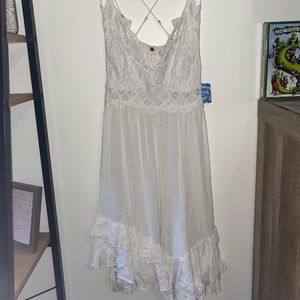 Free People white slip dress. Brand new, never worn, tags still on
